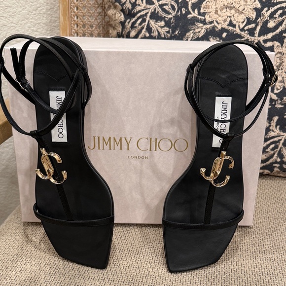 Jimmy Choo Shoes - Jimmy Choo Black Leather T-Strap Heels with Gold JC Logo